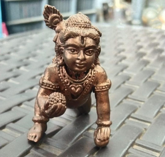 Krishna with laddu 1.5 inches